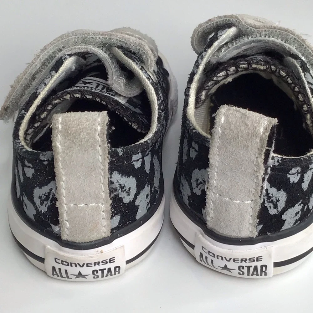 Converse Chuck Taylor All Star 2V Black and Gray Leopard Print Sneakers.